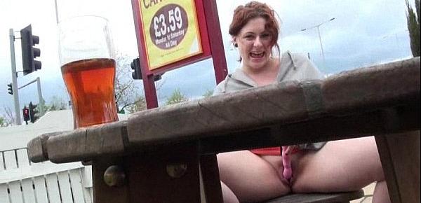  Upskirt and voyeur of English redhead amateur in public